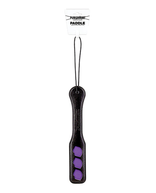 Punishment faux leather spanking paddle with lip-shaped cut-outs and wrist loop for playful BDSM restraint and kink play