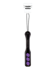 Punishment faux leather spanking paddle with lip-shaped cut-outs and wrist loop for playful BDSM restraint and kink play