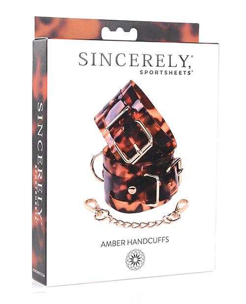 Sincerely Amber Handcuffs translucent tortoiseshell and gold-plated accents for stylish bondage restraint