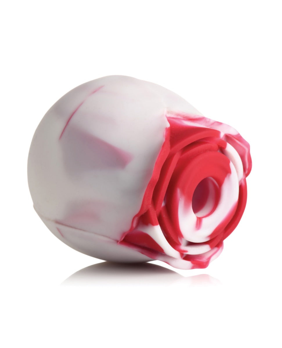 Close-up of the red and white Bloomgasm Rose Toy for targeted stimulation.